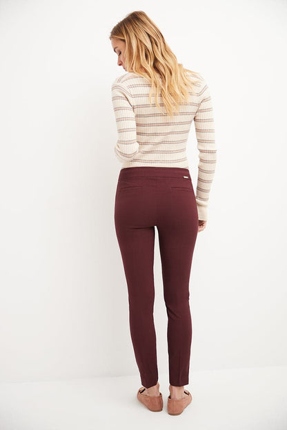 Skinny ankle pants with snaps