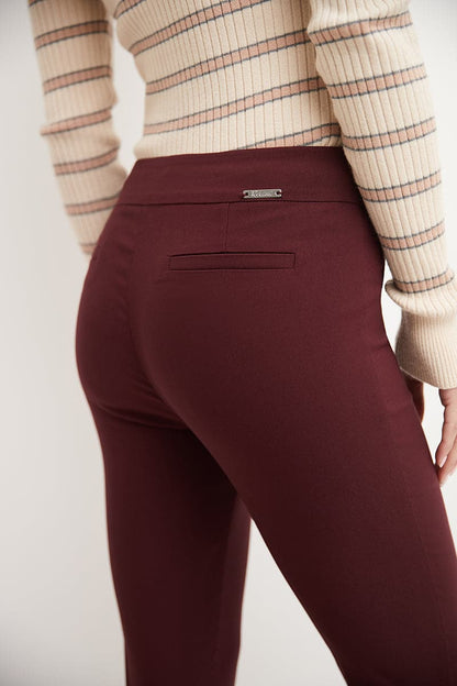 Skinny ankle pants with snaps