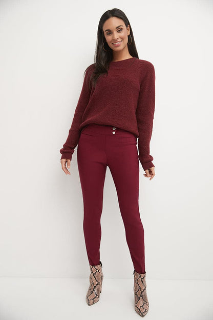 Skinny ankle pants with snaps