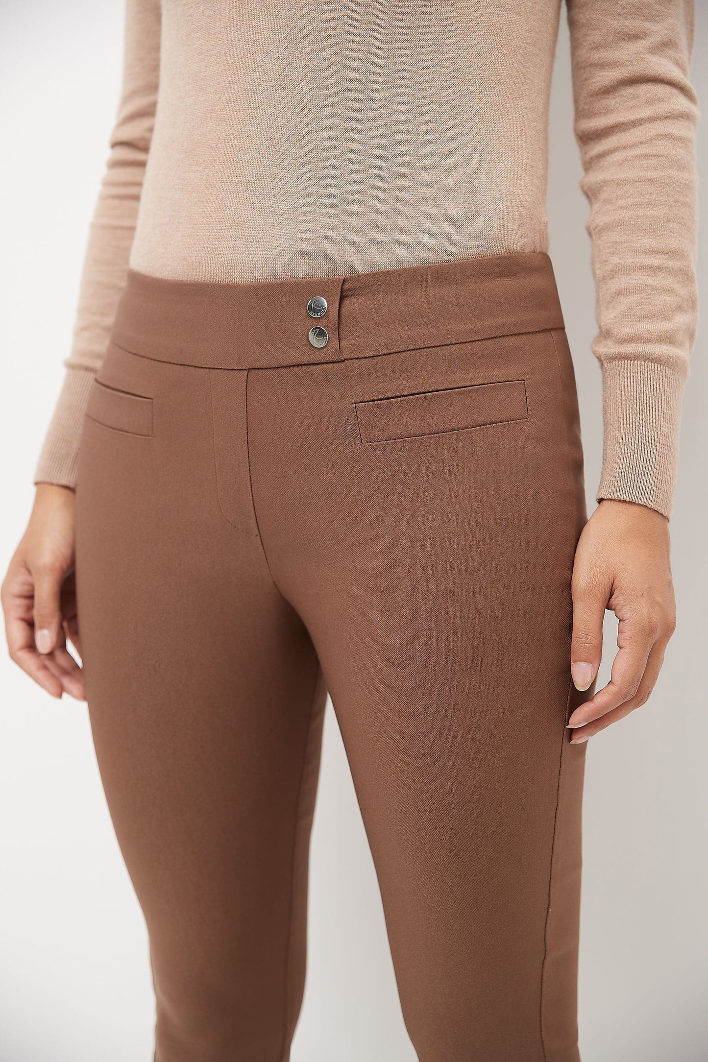 Skinny ankle pants with snaps